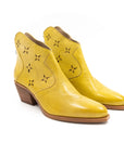 Lime-colored summer boots.