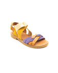 Flat sandals in yellow and purple.