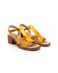 Heeled sandals in shades of brown and orange.