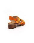 Sandals with small heels in shades of orange.