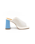 Perforated mules in white and blue.