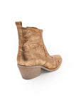 A single ankle boot with a bronze metallic finish and a low heel, isolated on a white background.