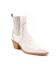 A white ankle boot with a heel, featuring a side zipper and decorative stitching detail.