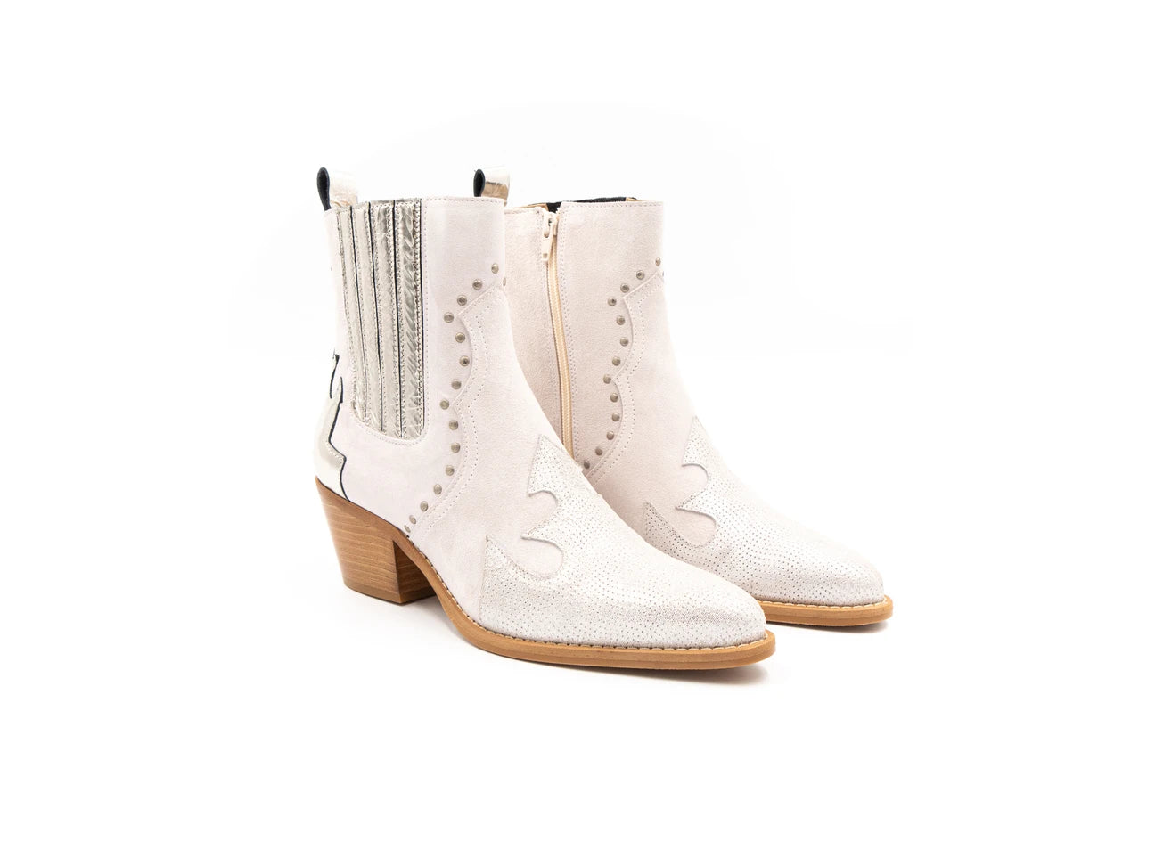 A white ankle boot with a heel, featuring a side zipper and decorative stitching detail.