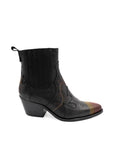 Black ankle boot with brown accents on a white background