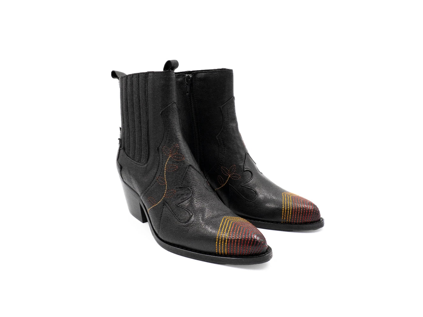 Black leather boots with multicolored tip on a white background