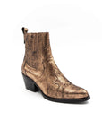 Gold metallic ankle boot on a white background
