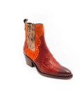 Boot with orange side panel on a white background