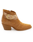 A brown ankle boot with a decorative buckle and a low heel, designed for women.