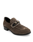 Brown loafer shoe with decorative band on a white background