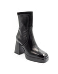 Black leather boot on a white background