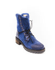 Blue suede boot on a white background