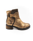 Bronze ankle boot with black accents on a white background