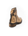 Brown leather boot on a white background