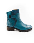 Blue ankle boot on a white background