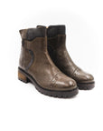 Pair of brown leather boots on a white background