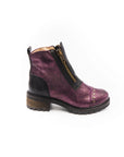 Purple ankle boot with a gold zipper on a white background