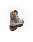 Brown leather boot on a white background