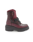 Maroon boot with black sole on a white background