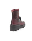 Burgundy boot on a white background
