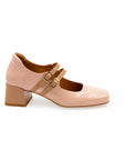 A pink Mary Jane style heel with a squared toe and buckle strap.