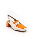 A white and orange two-tone patent leather moccasin style heel with an adjustable back strap.