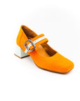 A bright orange Mary Jane style shoe with a squared toe and a 4cm heel, featuring a white buckle and a removable insole.