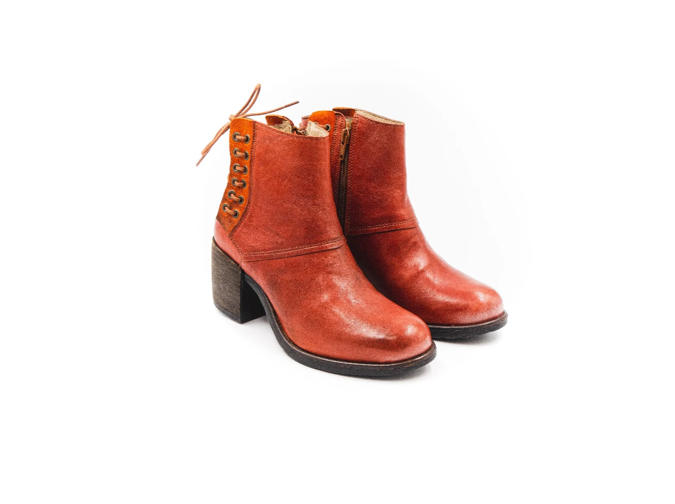 Pair of brown leather boots on a white background