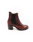 Brown leather ankle boot on a white background