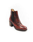 Brown leather boot on a white background