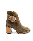 Brown leather boot with a metallic buckle on a white background