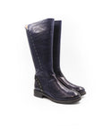 Pair of black knee-high boots on a white background