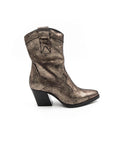 Gold heel pointed boot.