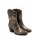 Pair of metallic bronze boots on a white background