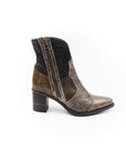 Brown and black boot with zipper on a white background