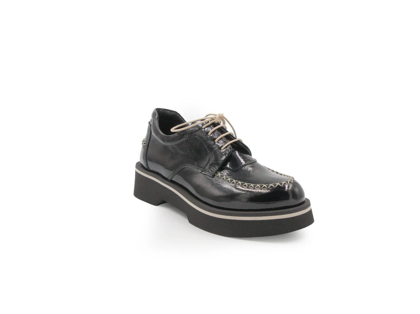 Black leather shoe with a platform sole on a white background