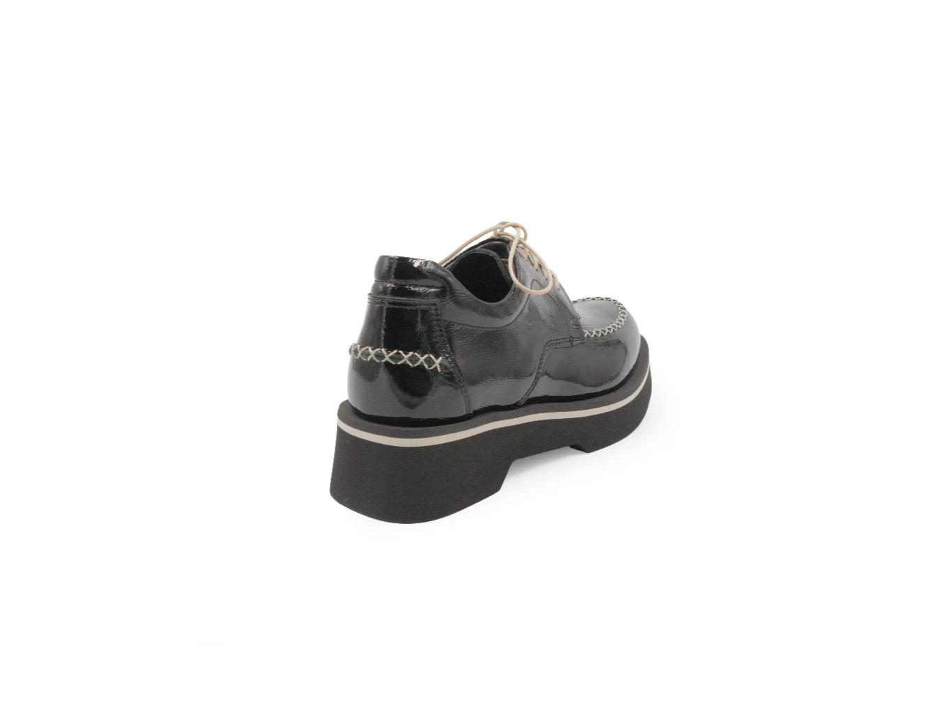 Black platform shoe on a white background