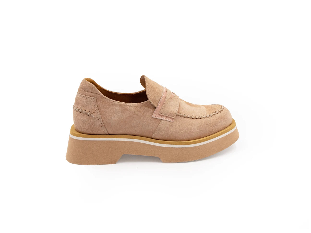 A beige suede loafer with a contrast color sole.