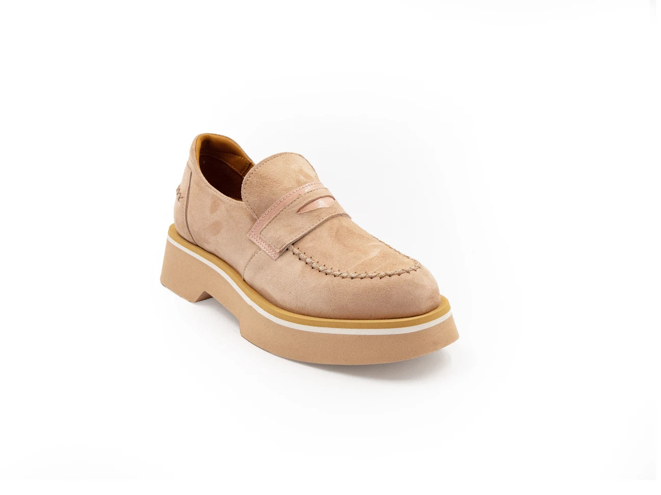 A beige suede loafer with a contrast color sole.
