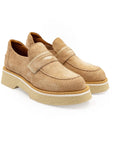 Pair of tan loafers on a white background