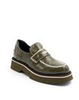 Green leather shoe with a thick sole on a white background
