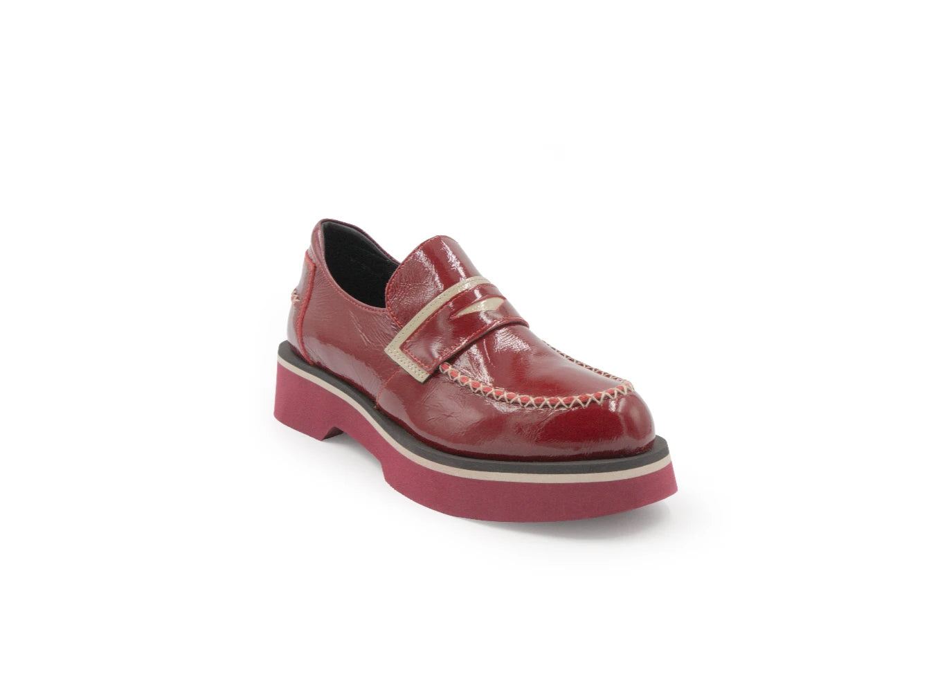 Red leather shoe with a strap on a white background