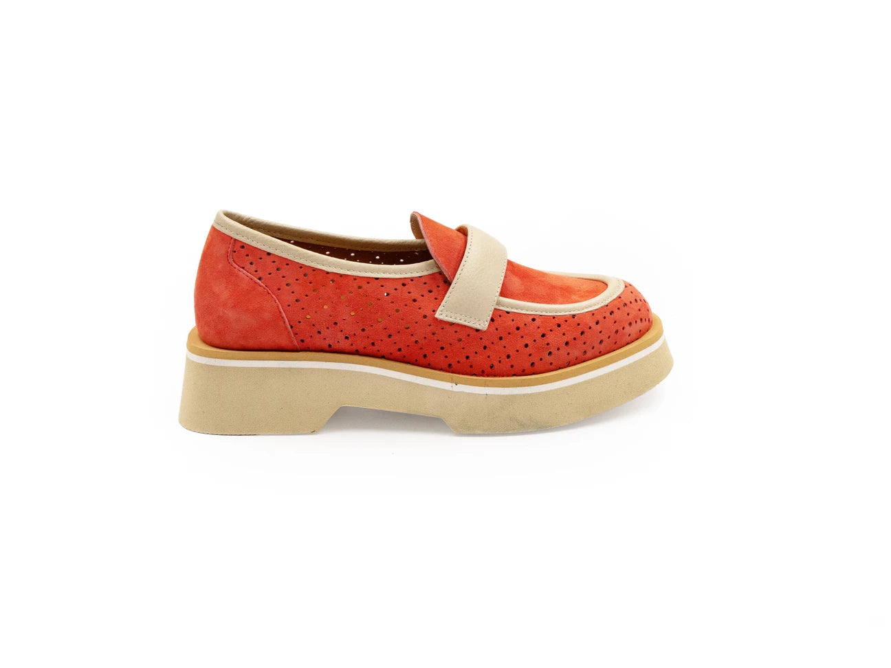 A red flat shoe with a white strap and a beige sole, designed for women.