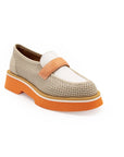 A beige and orange flat shoe with a perforated upper and a solid orange sole.