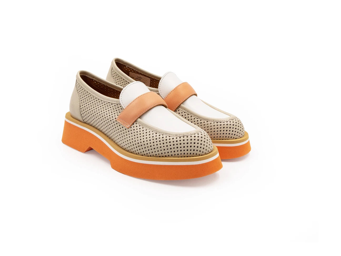 A beige and orange flat shoe with a perforated upper and a solid orange sole.