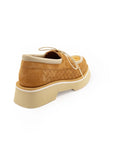 A tan-colored, slip-on casual shoe made of leather with a super light EVA foamed outsole.