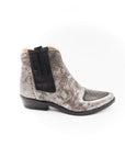 Gray suede ankle boot with black elastic side on a white background