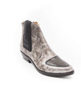 Gray Chelsea boot with black accents on a white background