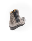 Gray ankle boot with black accents on a white background