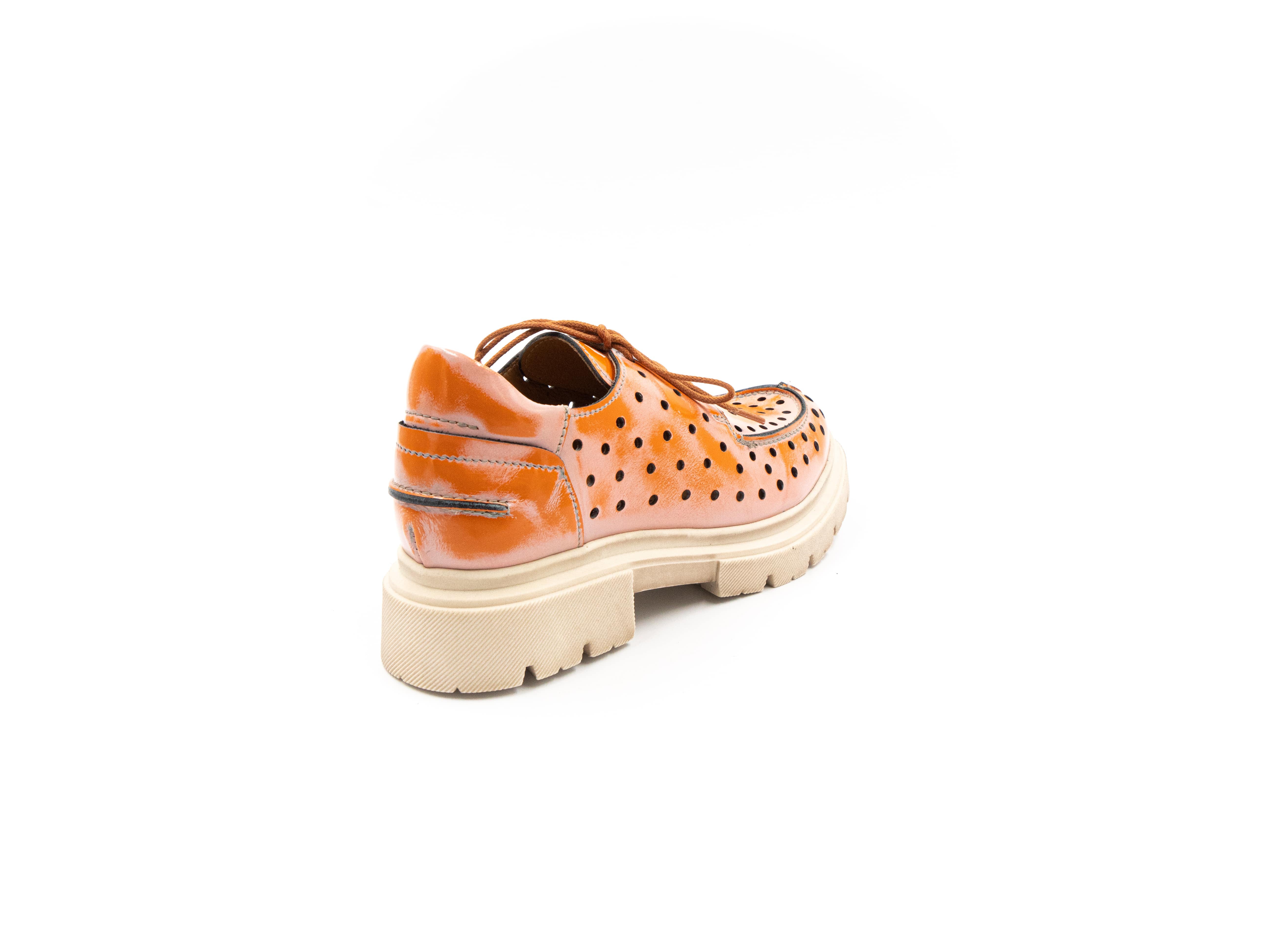 Perforated summer shoes.